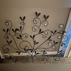 Wall art with tea cup candle holders